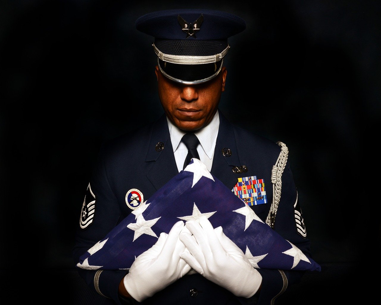 Air Force Officer Holding US Flag